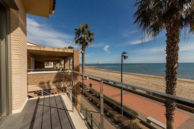 Foto 1 de Casa adossada en venda a Playa de Puçol de 4 habitacions amb terrassa i balcó
