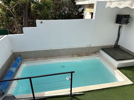 Foto 1 de Venta de casa en calle Costa del Silencio Costa Arona de 2 habitaciones con terraza y piscina
