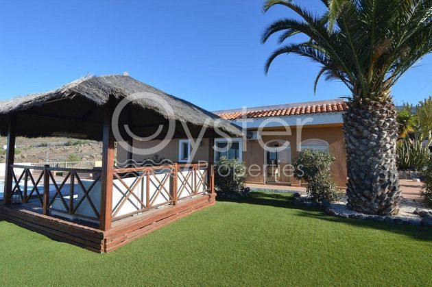 Foto 1 de Casa rural en venta en La Quinta - Taucho de 3 habitaciones con piscina y garaje