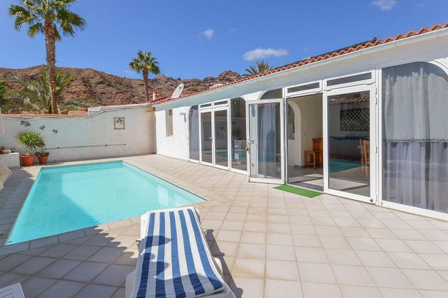 Foto 1 de Chalet en venta en Playa del Cura - Taurito de 4 habitaciones con terraza y piscina