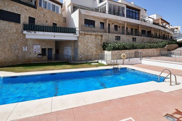Foto 1 de Casa adossada en venda a Torreblanca del Sol de 4 habitacions amb terrassa i piscina