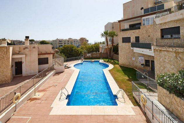 Foto 2 de Casa adossada en venda a Torreblanca del Sol de 4 habitacions amb terrassa i piscina