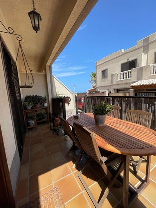 Foto 1 de Venta de casa adosada en El Médano de 3 habitaciones con terraza y garaje