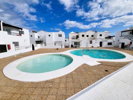 Foto 1 de Casa en venda a Puerto del Carmen de 3 habitacions amb terrassa i piscina