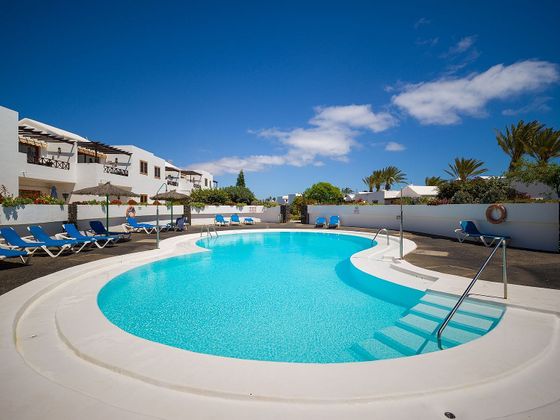 Foto 1 de Casa en venta en Puerto del Carmen de 3 habitaciones con piscina y jardín