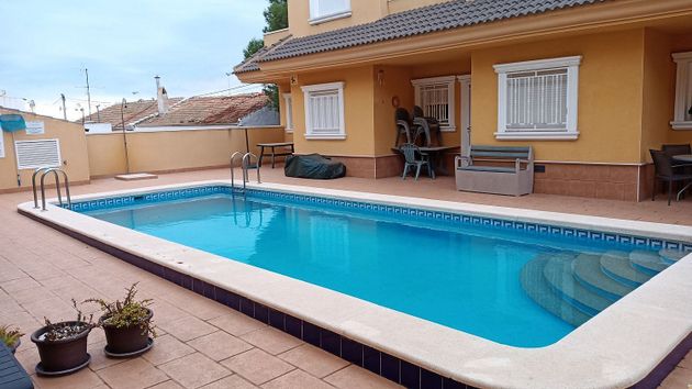 Foto 1 de Casa adossada en venda a La Marina de 2 habitacions amb terrassa i piscina