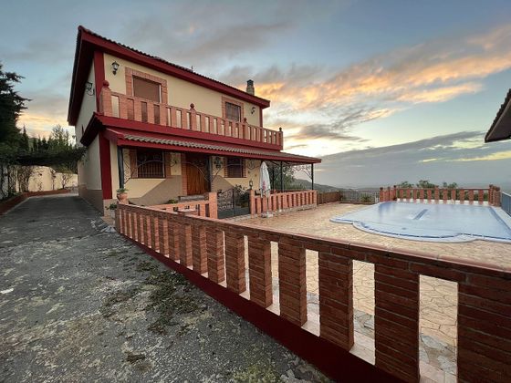 Foto 1 de Venta de chalet en Torre del Campo de 5 habitaciones con terraza y piscina