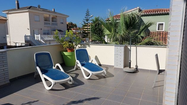 Foto 1 de Casa en lloguer a Oliva Playa de 2 habitacions amb terrassa i piscina