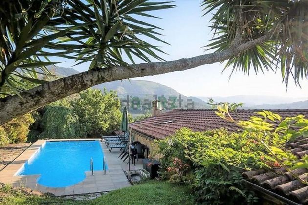 Foto 1 de Casa en venta en Castrelo de Miño de 5 habitaciones con terraza y piscina