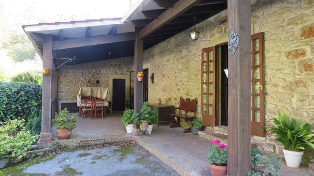 Foto 2 de Xalet en venda a Soto del Barco de 9 habitacions amb terrassa i garatge