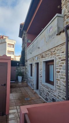Foto 1 de Venta de casa adosada en Noalla de 3 habitaciones con terraza y garaje