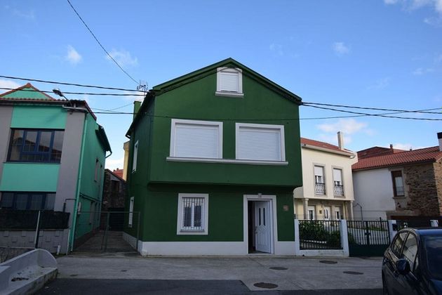 Foto 1 de Casa adossada en venda a Miño de 4 habitacions i 130 m²
