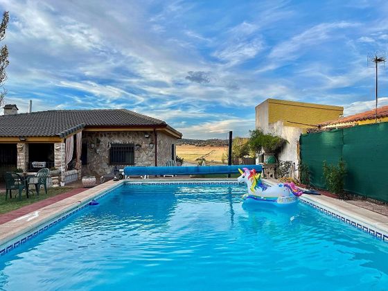 Foto 2 de Venta de chalet en Masegoso de Tajuña de 4 habitaciones con piscina y garaje