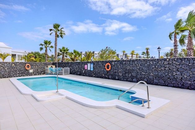 Foto 1 de Chalet en venta en Puerto del Carmen de 3 habitaciones con terraza y piscina