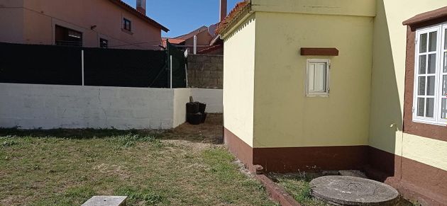 Foto 2 de Casa en venta en Ribeira de 3 habitaciones con garaje y jardín