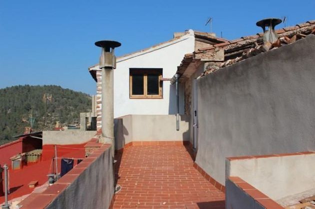 Foto 1 de Casa adosada en venta en Eslida de 8 habitaciones con terraza