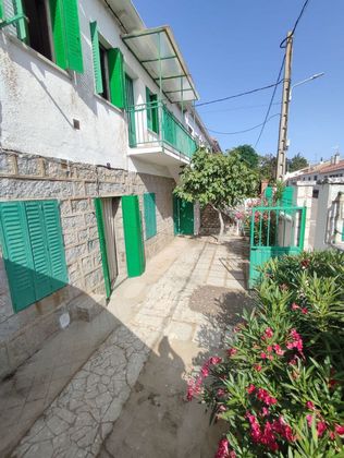 Foto 2 de Casa adosada en venta en calle Santa Teresa de 7 habitaciones con terraza y jardín