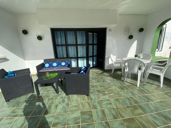 Foto 1 de Casa adosada en alquiler en Puerto Rico de 2 habitaciones con terraza y piscina