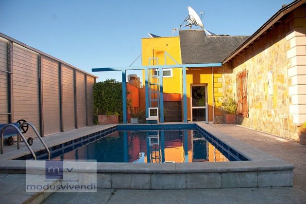 Foto 1 de Chalet en venta en San Andrés del Rabanedo de 6 habitaciones con piscina