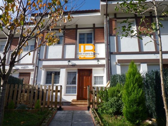 Foto 1 de Casa adossada en venda a Ramales de la Victoria de 3 habitacions amb terrassa i garatge