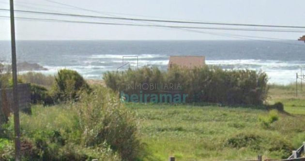 Foto 2 de Venta de terreno en Porto do Son de 1020 m²