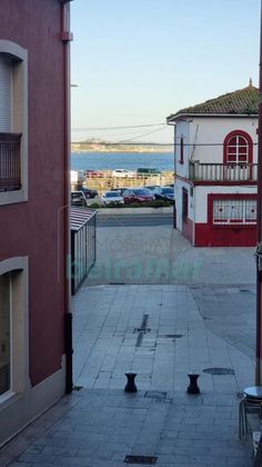 Foto 1 de Casa en venta en Ribeira de 3 habitaciones con balcón