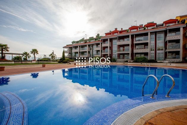 Foto 2 de Pis en venda a Adina-Portonovo de 2 habitacions amb terrassa i piscina