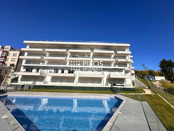 Foto 1 de Venta de piso en calle Augusto González Besada de 2 habitaciones con terraza y piscina