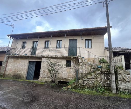 Foto 1 de Casa adossada en venda a Punxín de 4 habitacions amb piscina i garatge