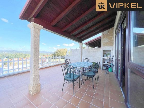 Foto 1 de Casa en venda a Brión de 5 habitacions amb terrassa i piscina