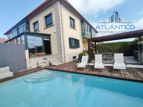 Foto 1 de Casa adosada en venta en Mesoiro de 3 habitaciones con terraza y piscina