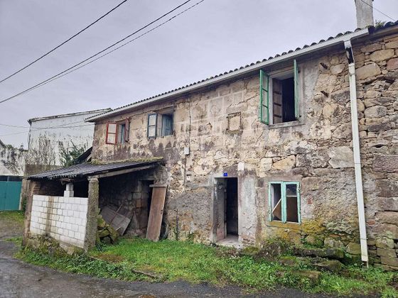 Foto 1 de Casa adossada en venda a Boiro de 3 habitacions amb terrassa i calefacció