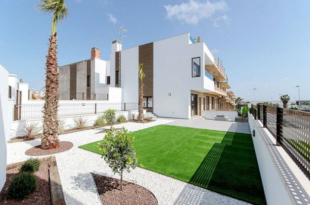 Foto 1 de Casa adosada en venta en Los Balcones - Los Altos del Edén de 3 habitaciones con terraza y piscina