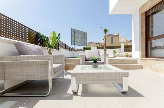 Foto 2 de Casa adossada en venda a Los Balcones - Los Altos del Edén de 3 habitacions amb terrassa i piscina