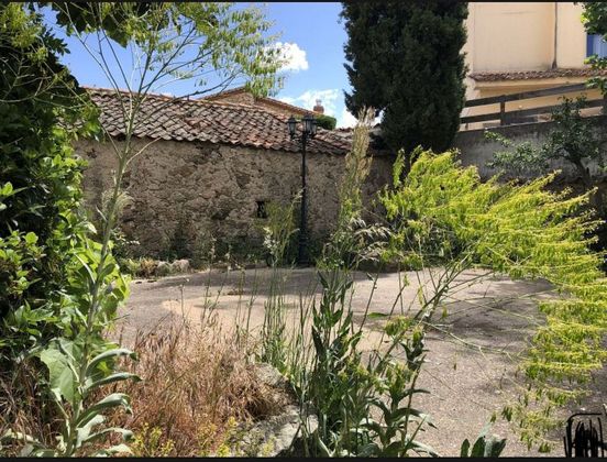 Foto 2 de Casa en venda a Torrecaballeros de 1 habitació amb jardí i calefacció