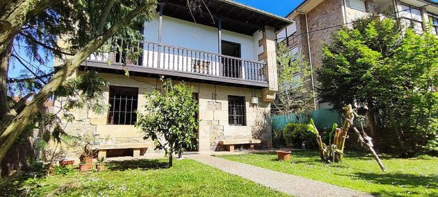 Foto 1 de Casa en venda a Corrales de Buelna (Los) de 3 habitacions amb garatge i jardí