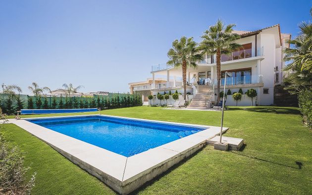 Foto 1 de Xalet en venda a urbanización Los Flamingos de 5 habitacions amb terrassa i piscina
