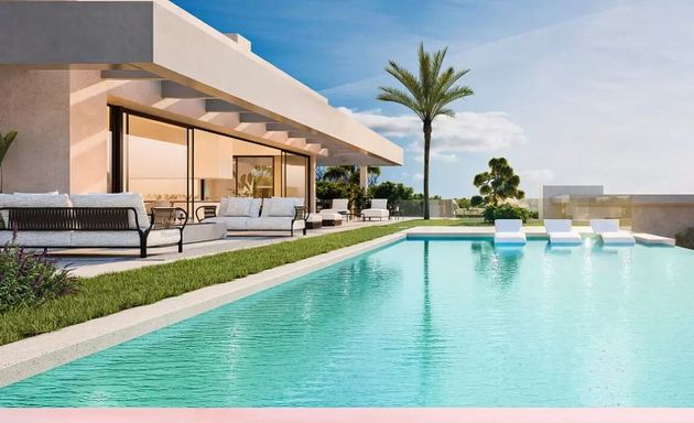 Foto 1 de Xalet en venda a urbanización Cascada de Camojan de 5 habitacions amb terrassa i piscina