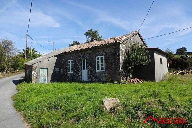 Foto 1 de Casa en venda a Brión de 3 habitacions amb garatge i jardí