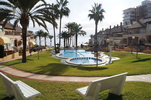 Foto 1 de Casa adossada en venda a Playa Mucha Vista de 6 habitacions amb terrassa i piscina