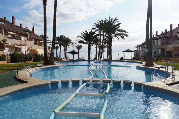 Foto 2 de Casa adosada en venta en Playa Mucha Vista de 6 habitaciones con terraza y piscina