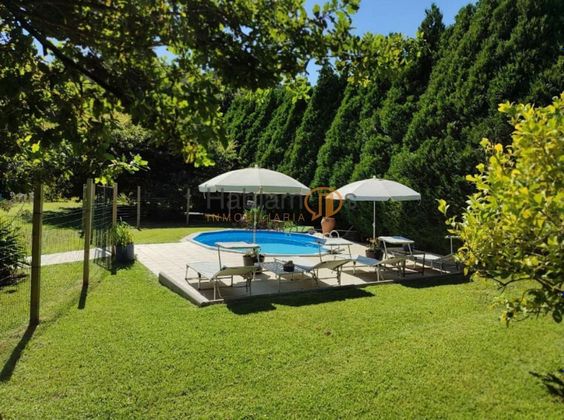 Foto 1 de Xalet en venda a Adina-Portonovo de 4 habitacions amb terrassa i piscina