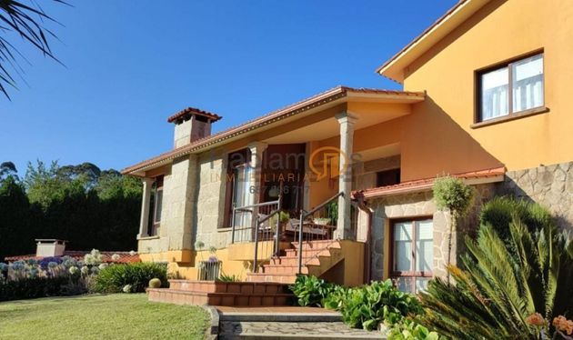Foto 2 de Chalet en venta en Adina-Portonovo de 4 habitaciones con terraza y piscina