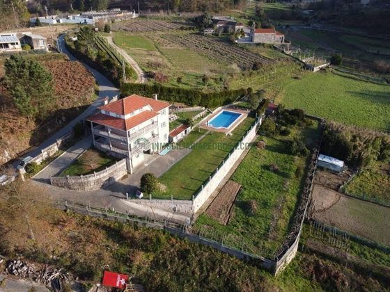 Foto 1 de Chalet en venta en Vilaboa de 5 habitaciones con terraza y piscina