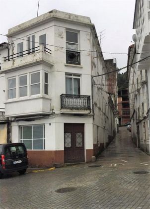 Foto 1 de Casa adossada en venda a calle Picho de 8 habitacions amb terrassa i balcó