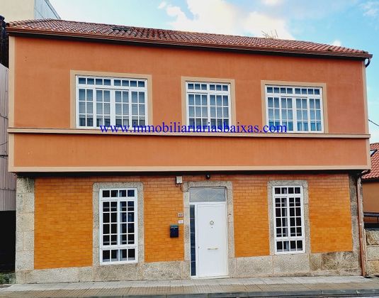 Foto 1 de Xalet en venda a Ribeira de 6 habitacions amb terrassa i garatge