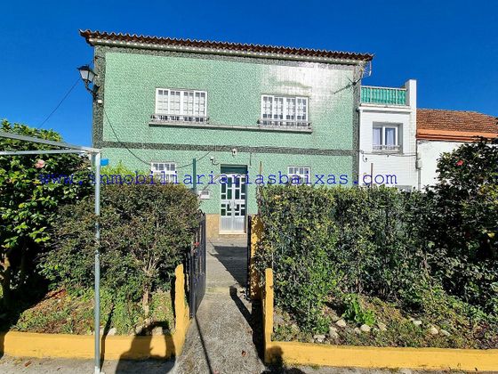 Foto 1 de Casa en venta en Ribeira de 7 habitaciones con terraza y garaje