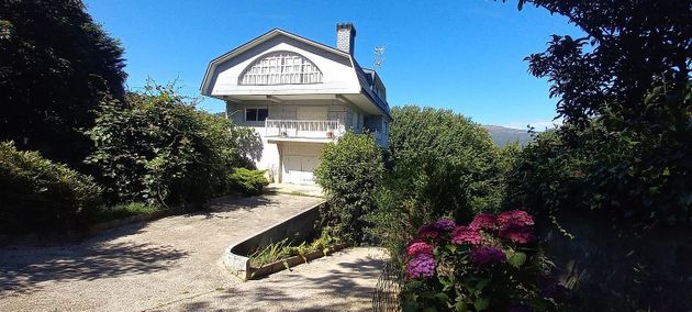 Foto 1 de Xalet en venda a calle Tarrio de 4 habitacions amb terrassa i jardí