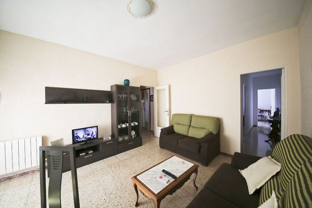 Foto 1 de Piso en venta en Tomelloso de 3 habitaciones con terraza y calefacción