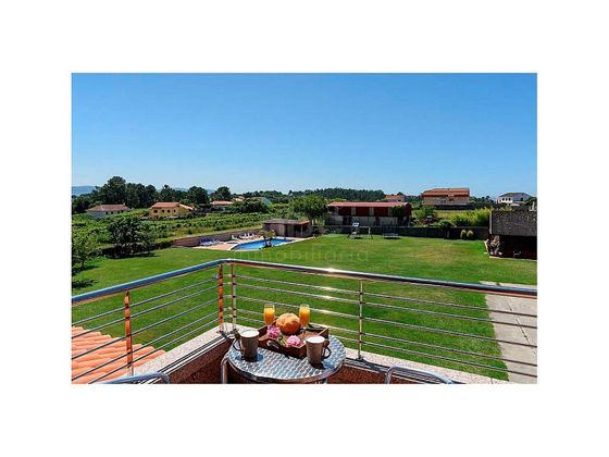 Foto 1 de Xalet en venda a Adina-Portonovo de 4 habitacions amb terrassa i piscina